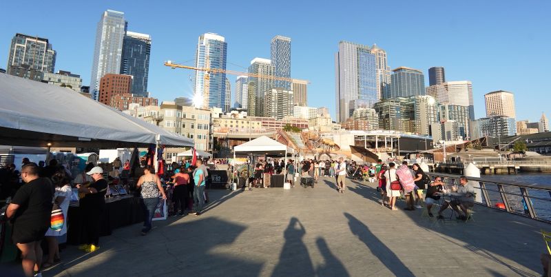 a sunny afternoon festival on a pier