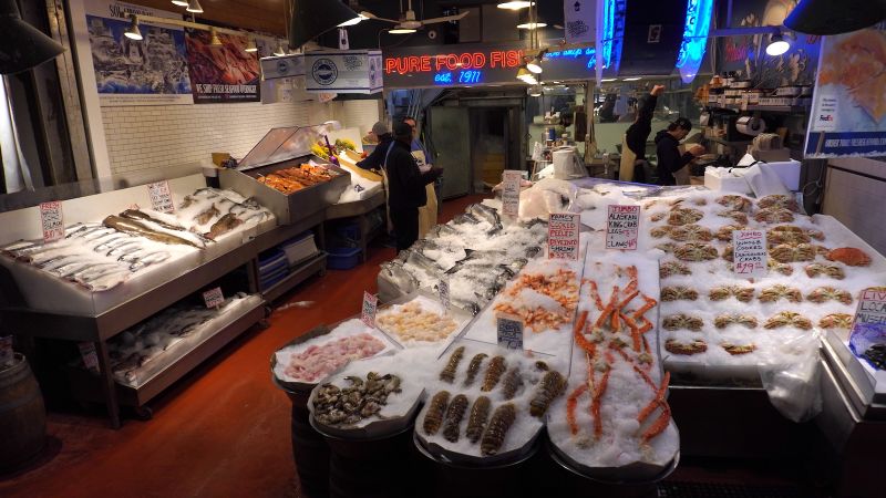 a fish market display of fresh fish on ice