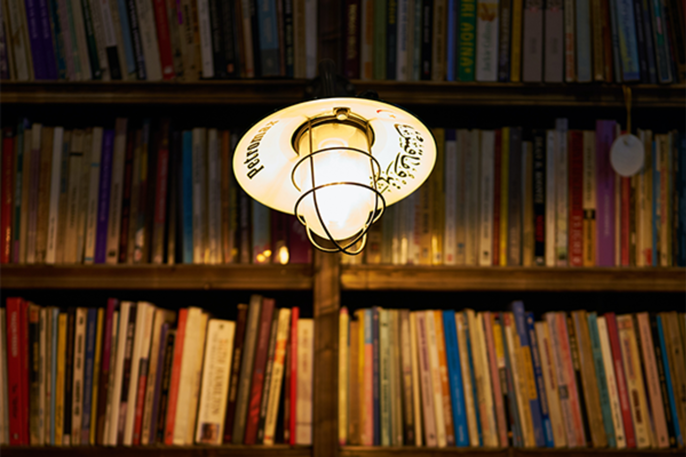 A light hangs in the library. 