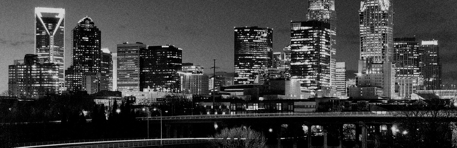 black and white panorama of buildings in Charlotte, NC