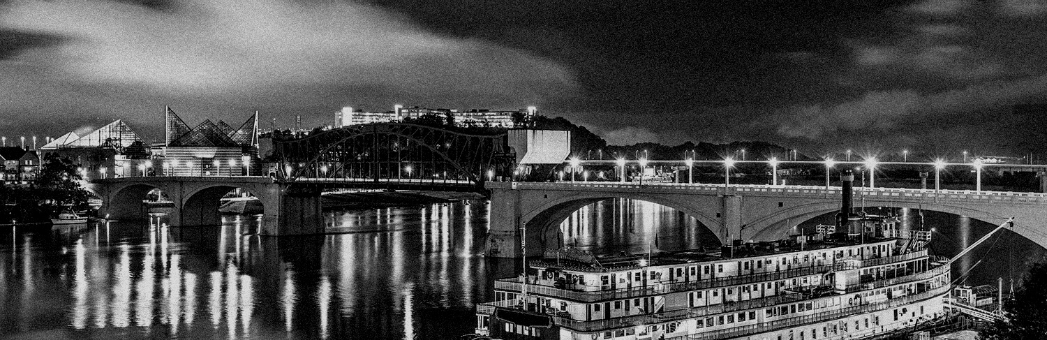 black and white panorama of waterfront and riverboat in Chattanooga, TN