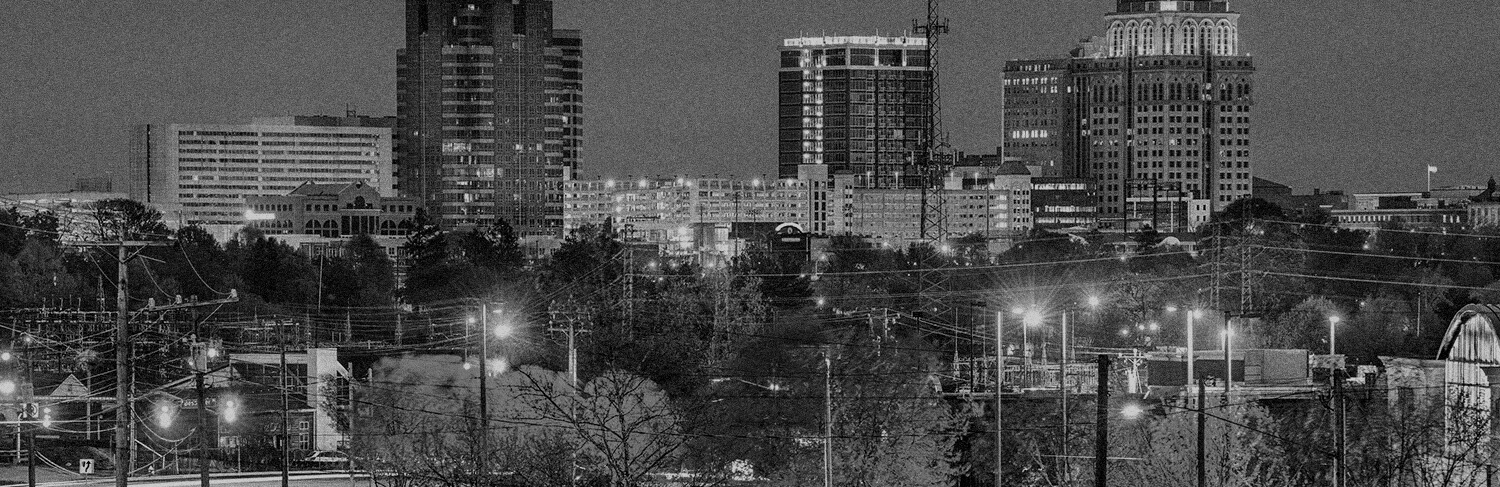 black and white panorama of buildings in Greensboro, NC