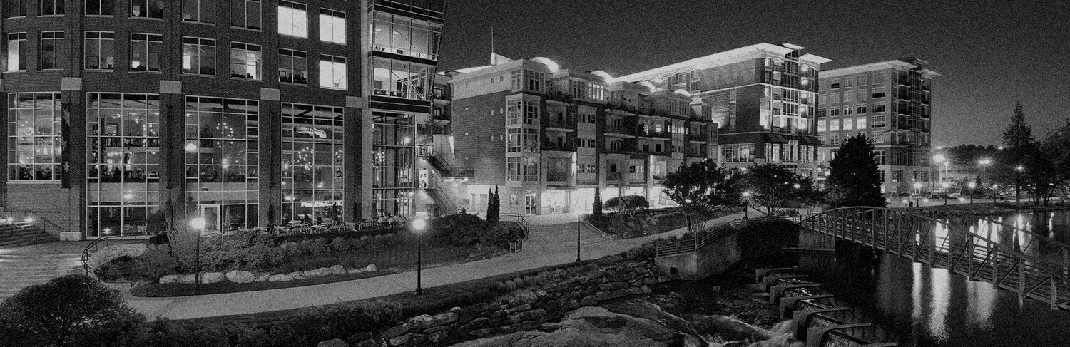 black and white panorama of buildings and waterfront in Greenville, NC