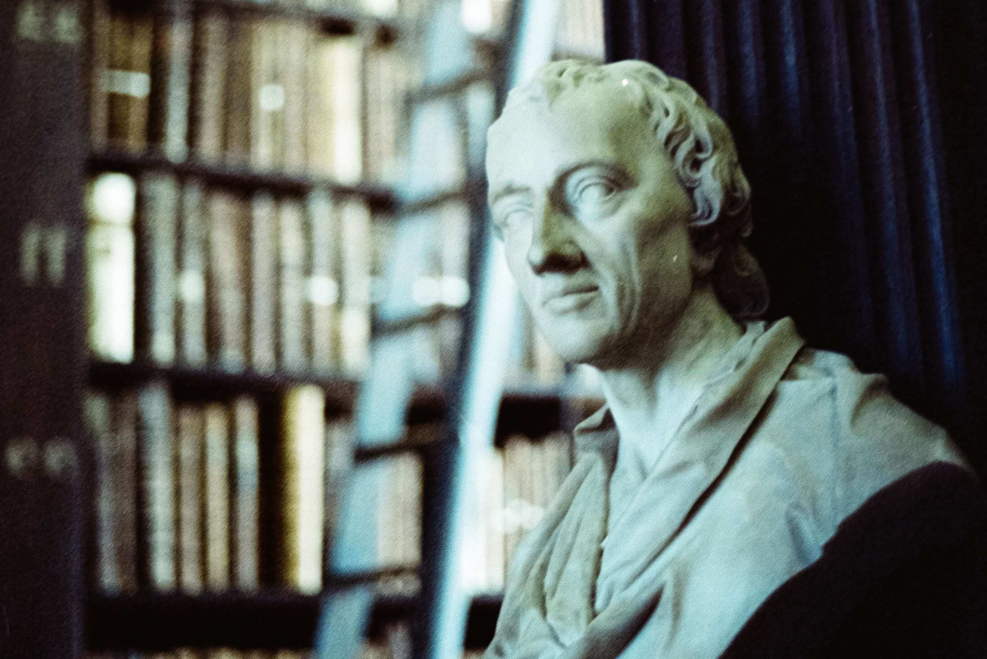 photo of a marble bust in a library