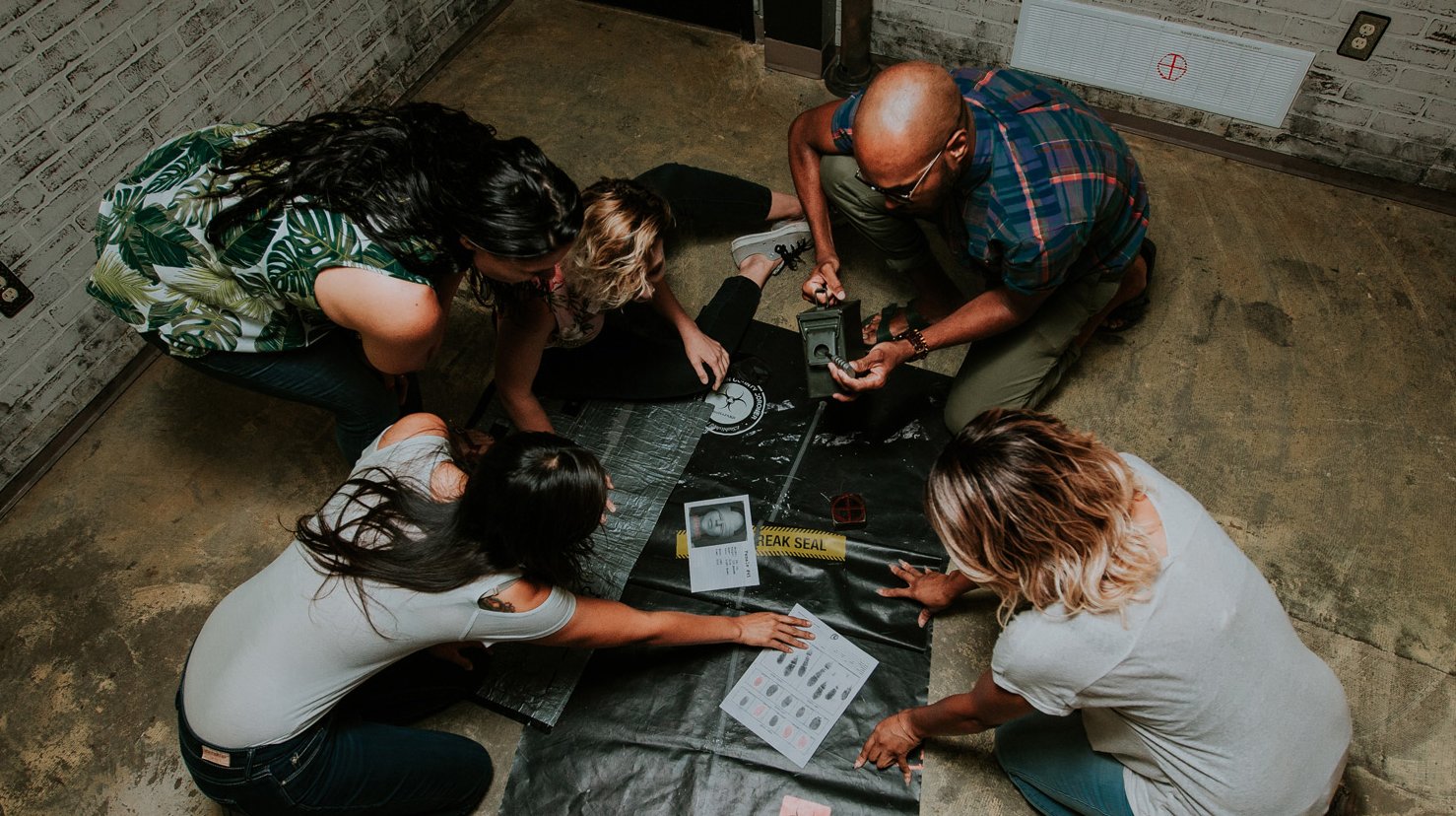 A group of team mates solving a puzzle