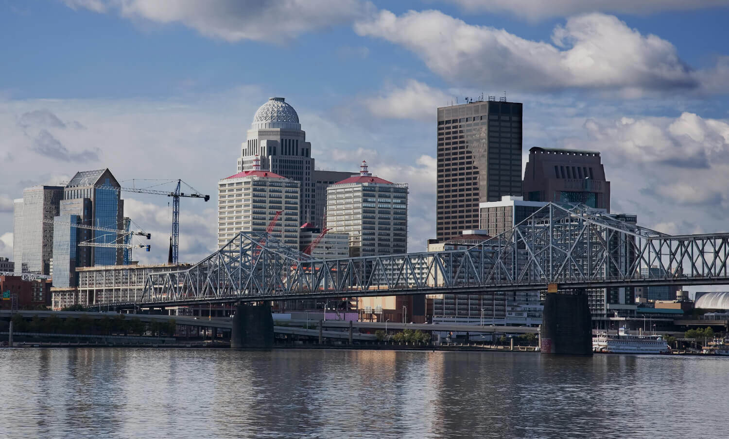 black and white panorama of buildings, bridge and river in Louisville, KY