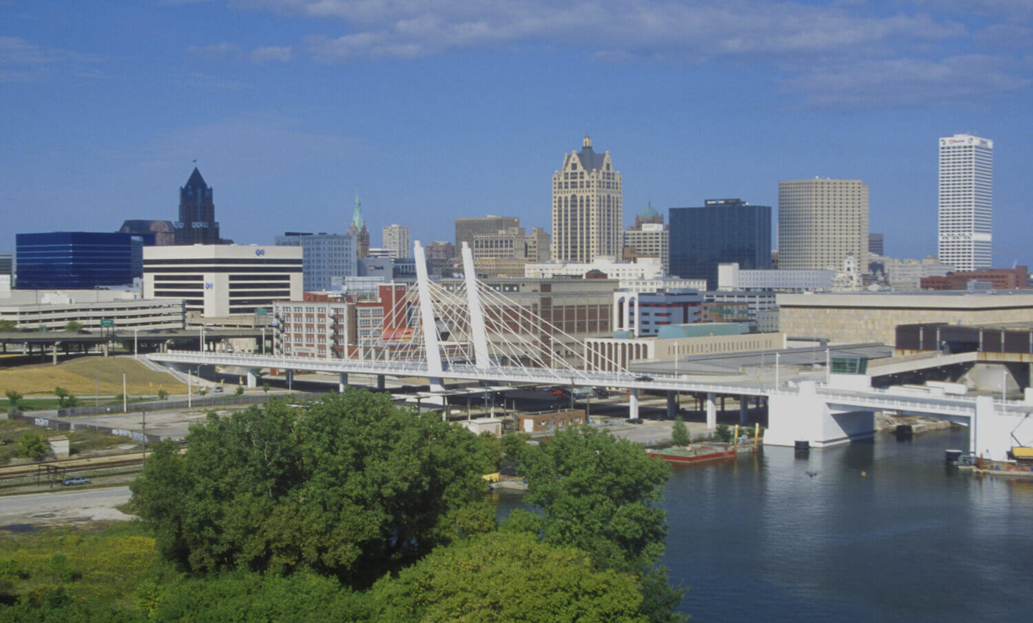 black and white panorama of buildings and water in Milwaukee, WI