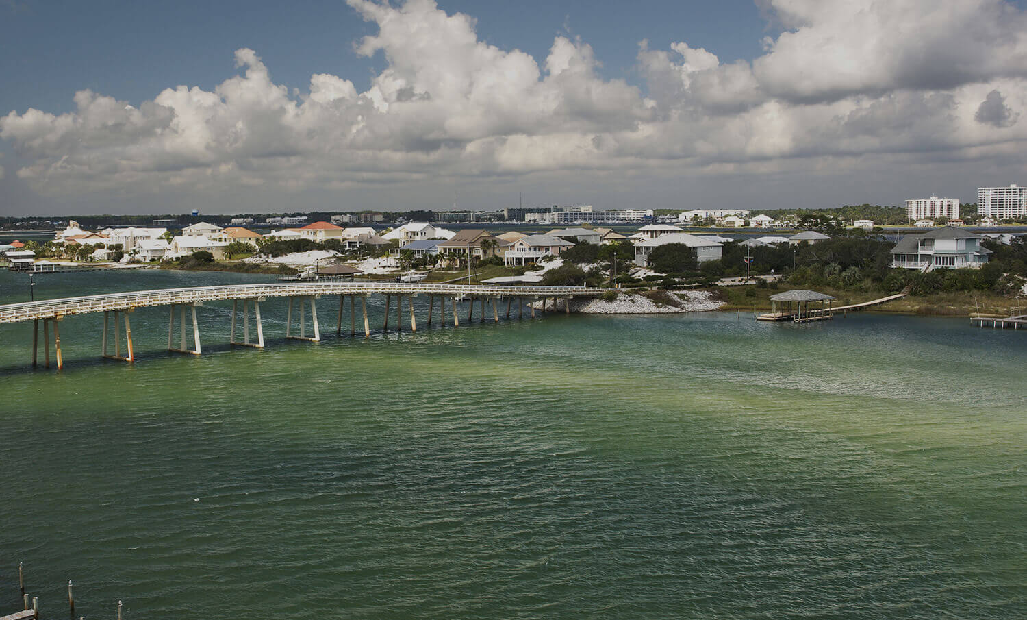 black and white panorama of waterfront and bridge in Orange Beach, AL