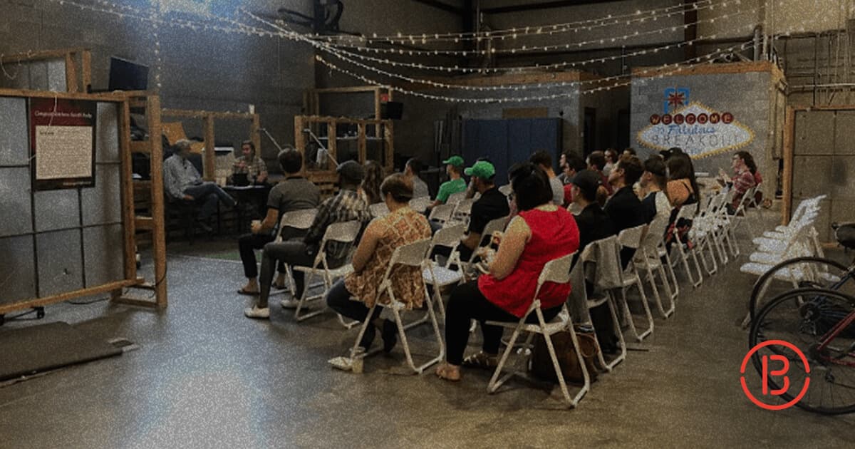 speaker giving a talk to the Breakout headquarters team at First Friday event in August
