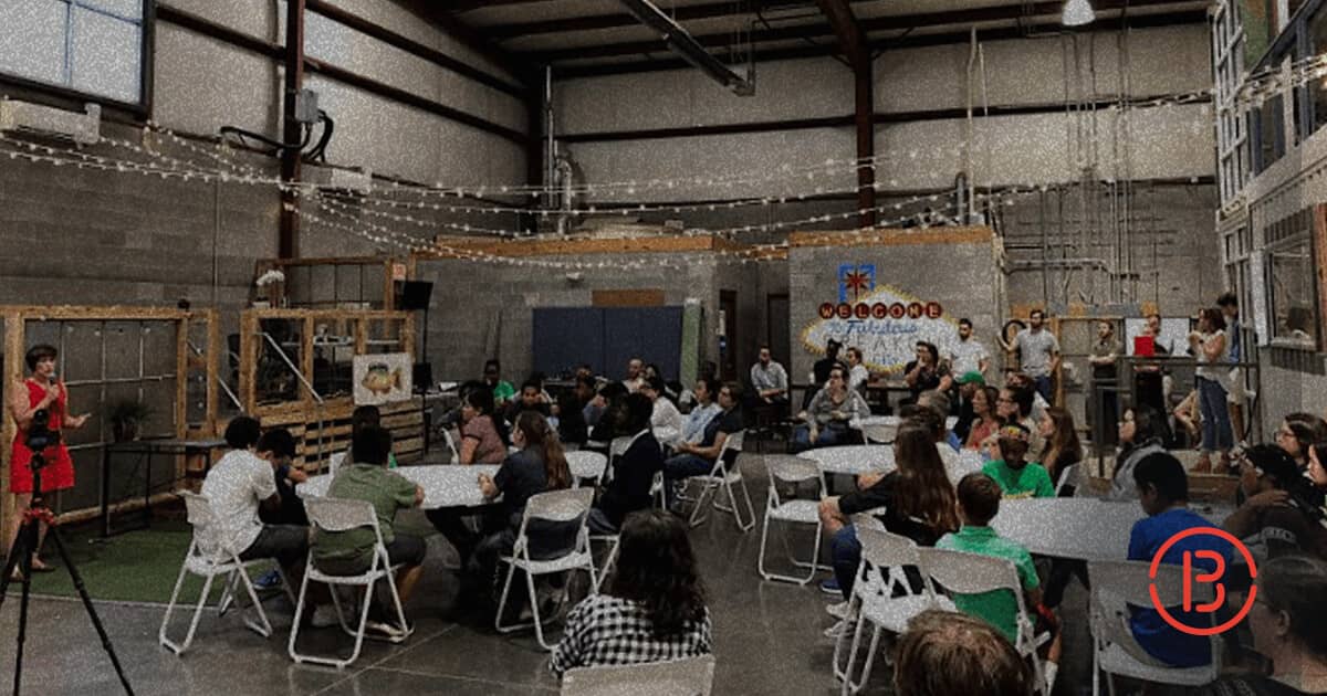 speaker giving a talk to the Breakout headquarters team at First Friday event in July