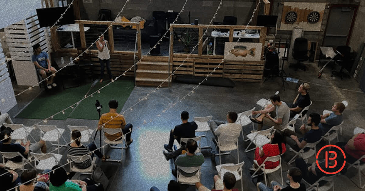 speaker giving a talk to the Breakout headquarters team at First Friday event in September