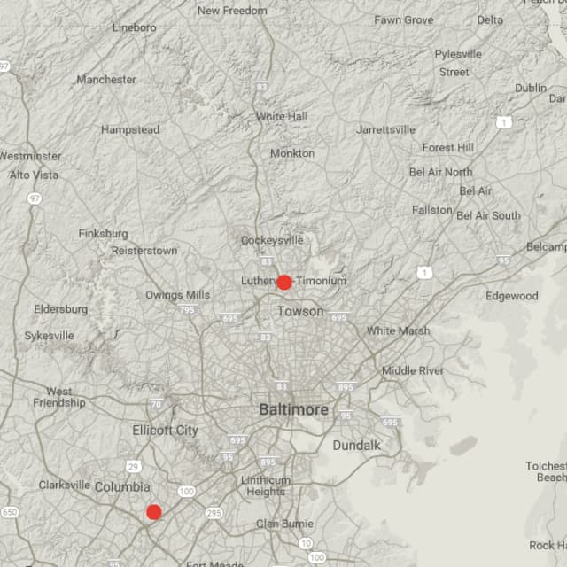 Simple map with two red dots indicating escape room locations in Baltimore, MD