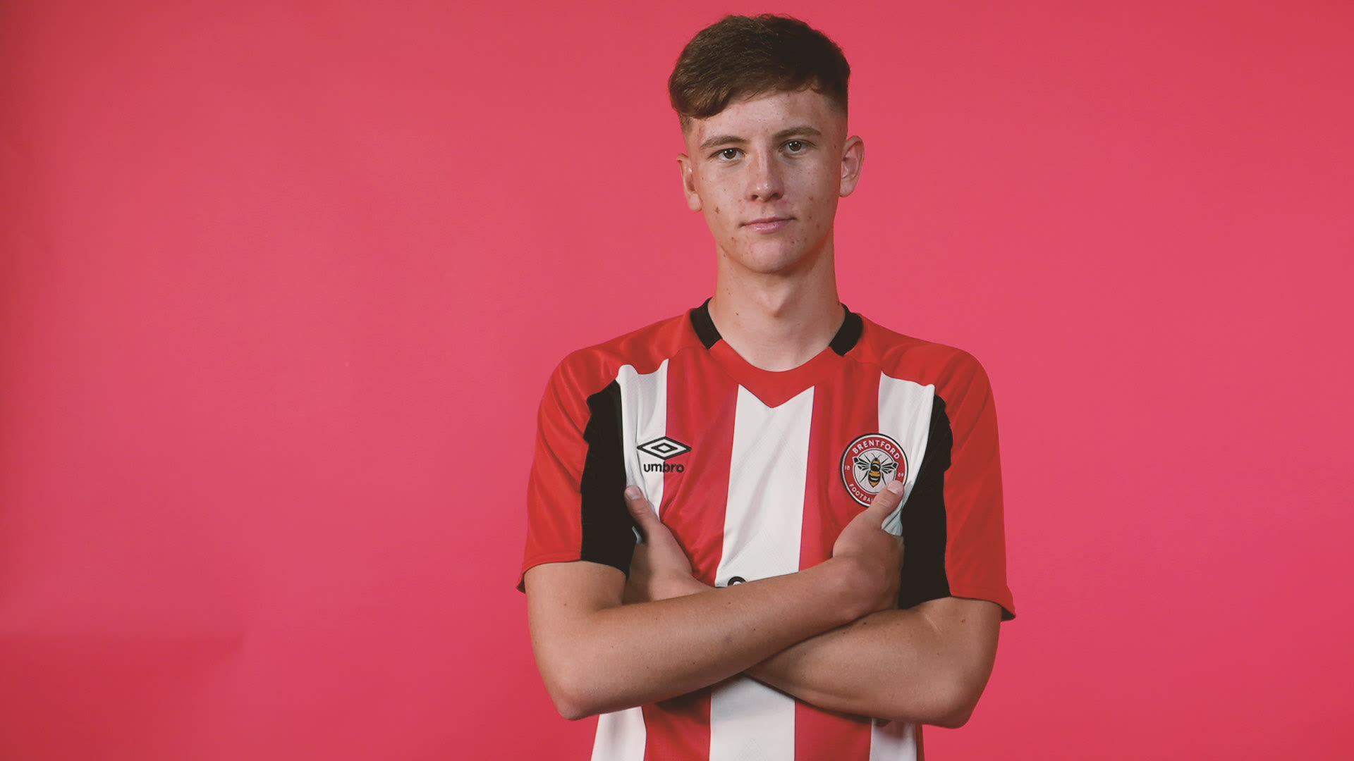 Ethan Laidlaw red backdrop