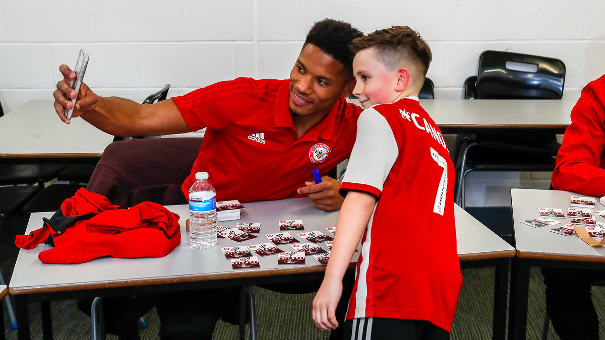 Young Brentford fans meet their footballing heroes