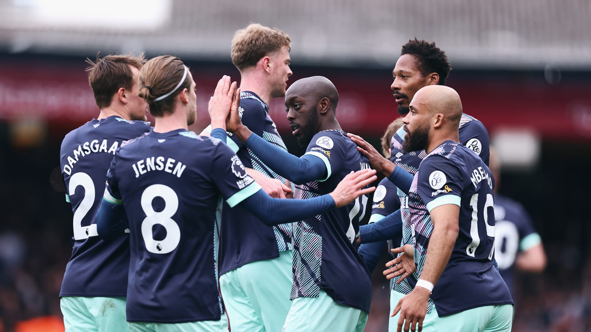 Group huddle celebration - Brentford