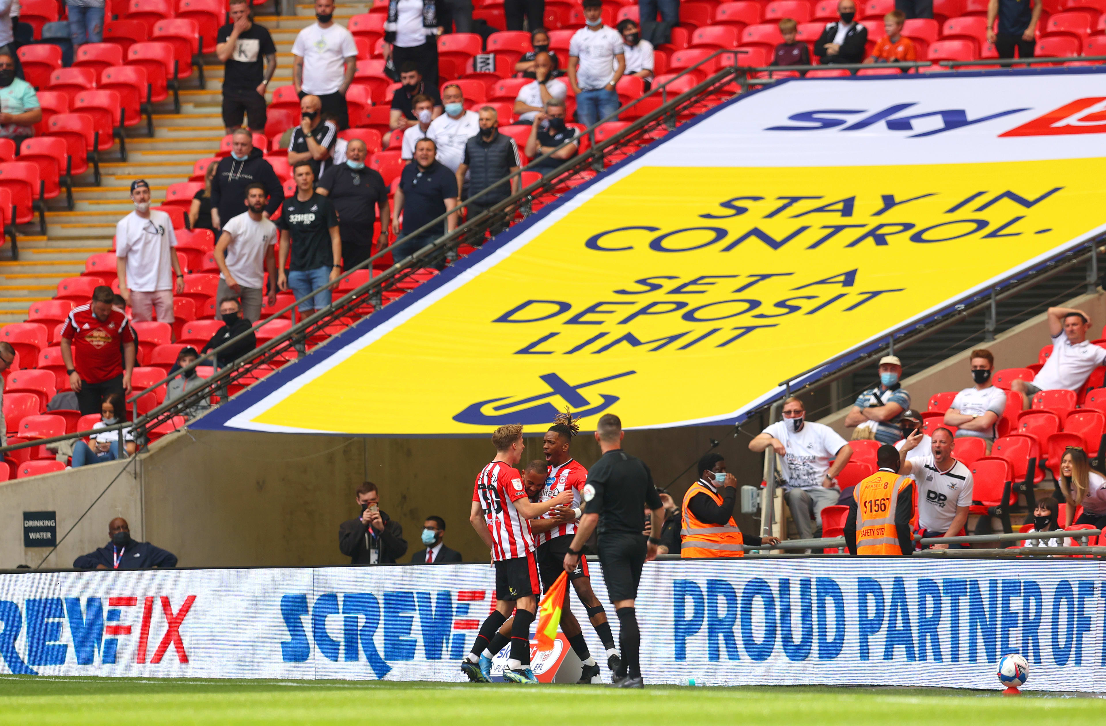 Ivan Toney celebrates scoring the opening goal of the 2020/21 Play Off final at Wembley