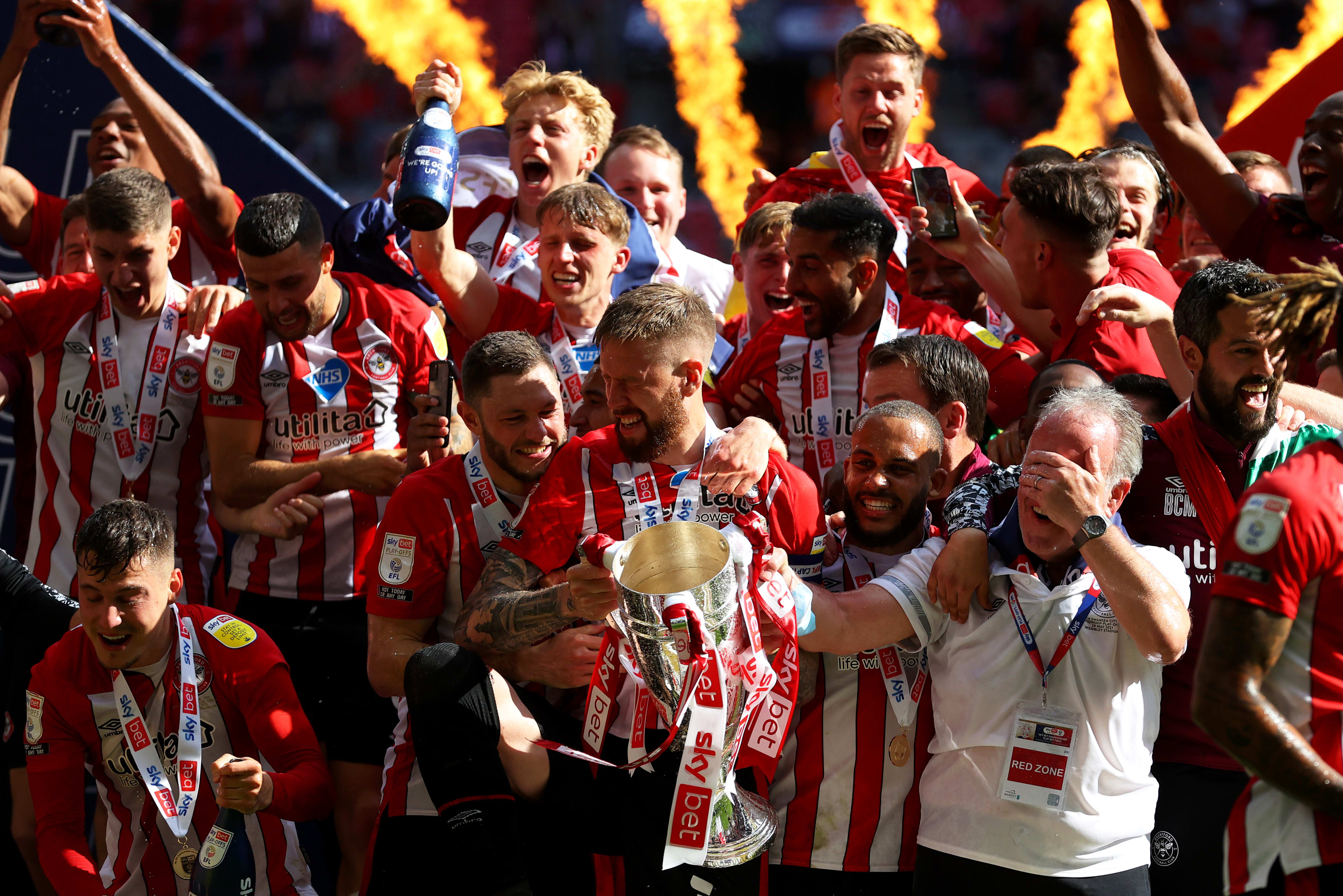 Peter Gilham joins the celebrations after Brentford FC win the 2020/21 Play Off final at Wembley