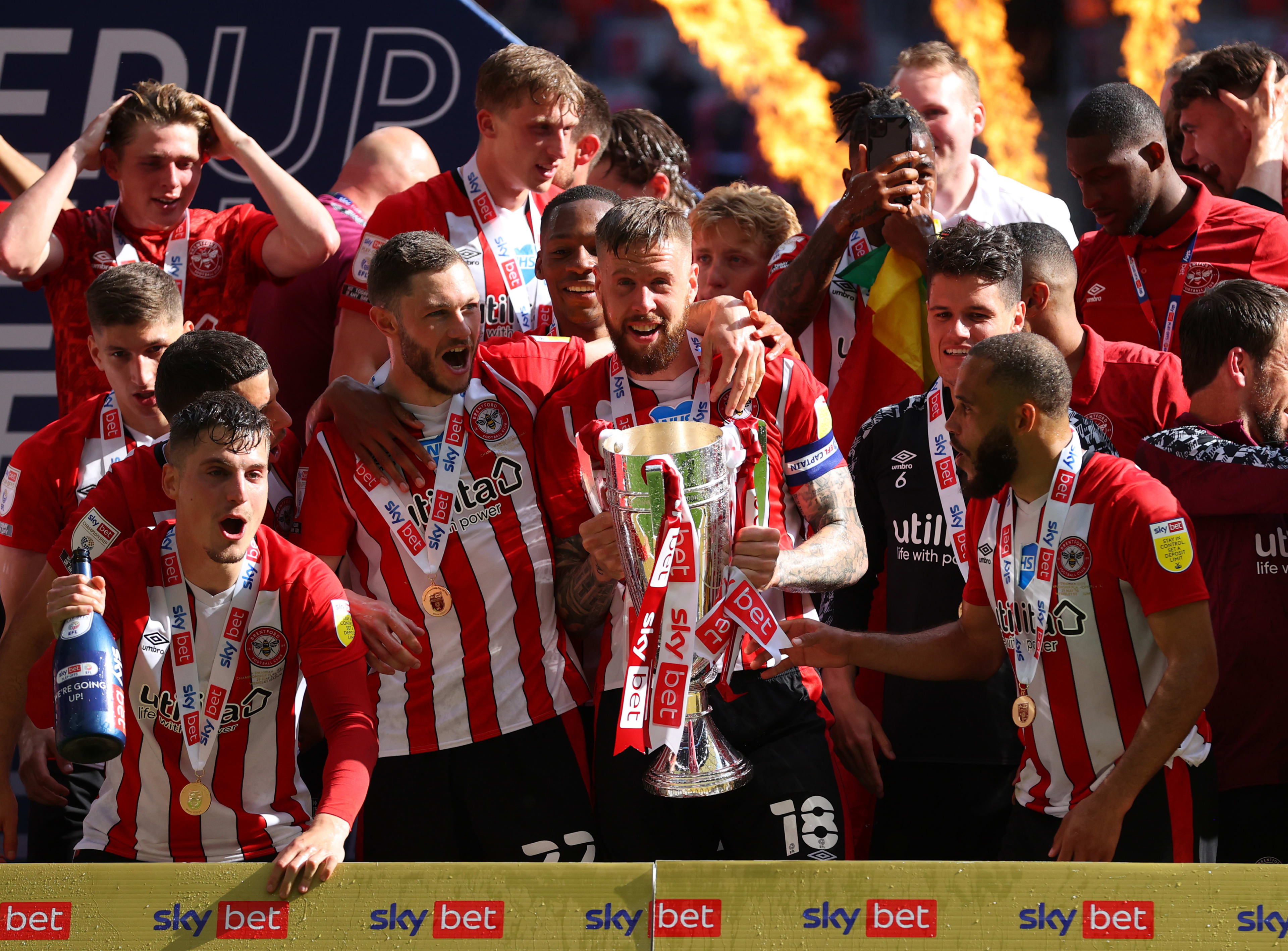 Pontus Jansson and Henrik Dalsgaard lead the celebrations after securing promotion to the Premier League via the Play Offs