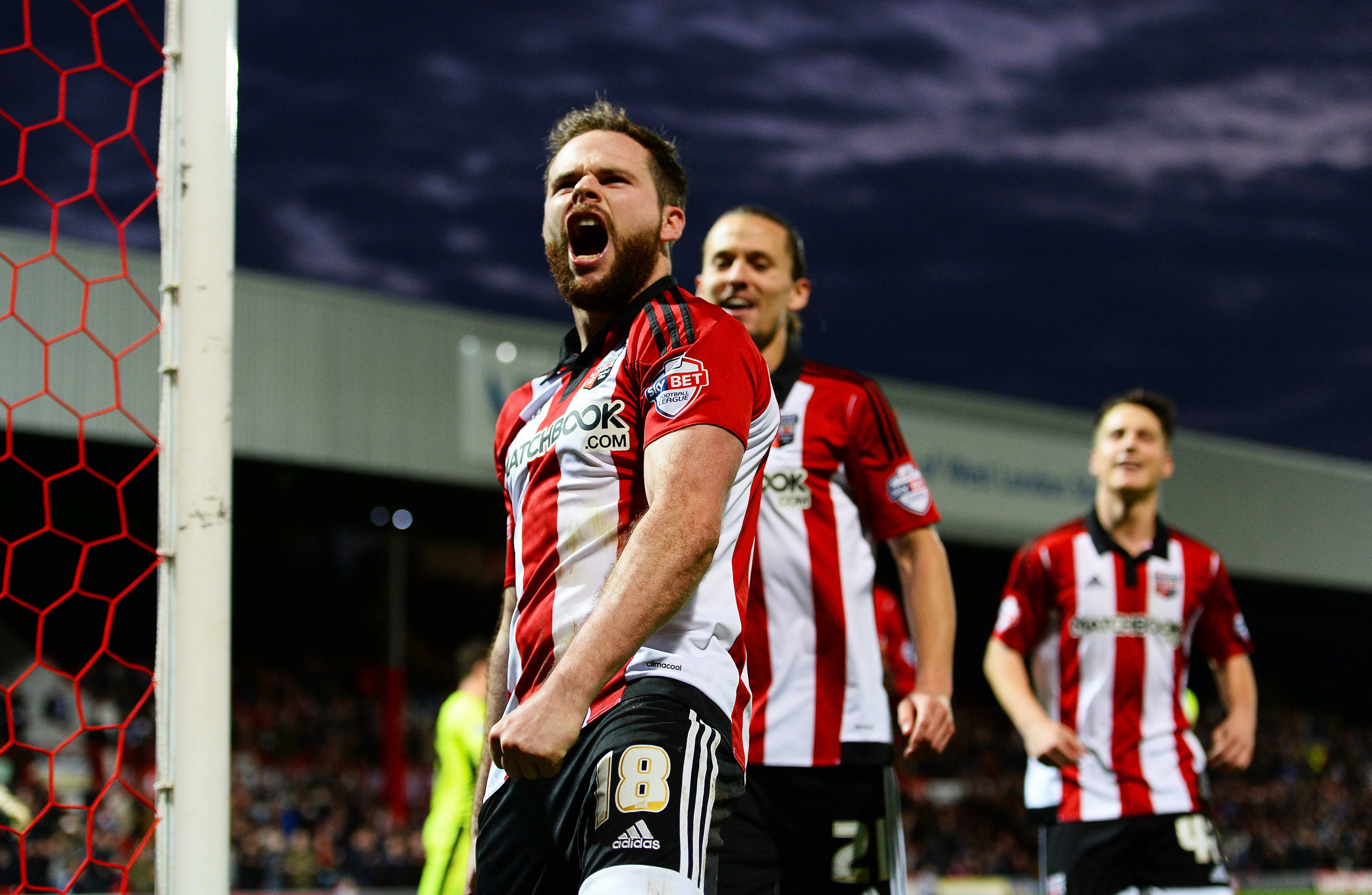Alan Judge celebrates scoring Brentford's 4th goal against Huddersfield Town at Griffin Park on 19 December 2015