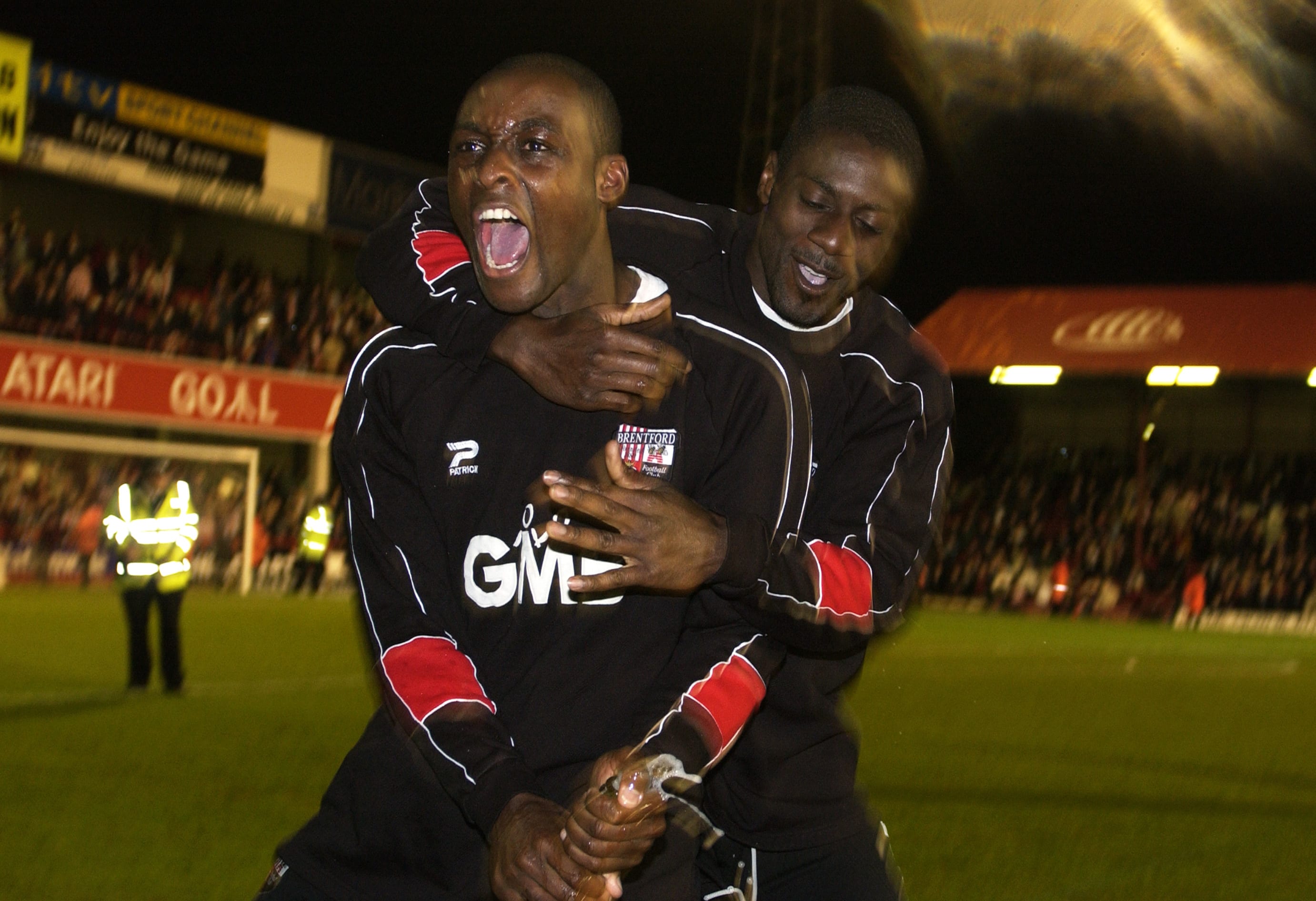 Lloyd Owusu and Darren Powell celebrate after winning the Nationwide Division Two Play-off Semi-Final