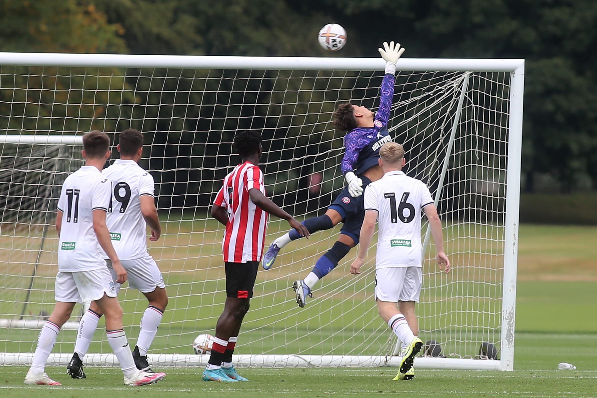 Roco Rees makes a save against The Swans 