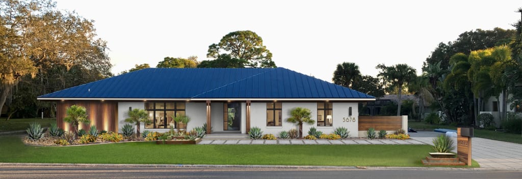 Virtual exterior design of a modern ranch with a classic blue metal roof