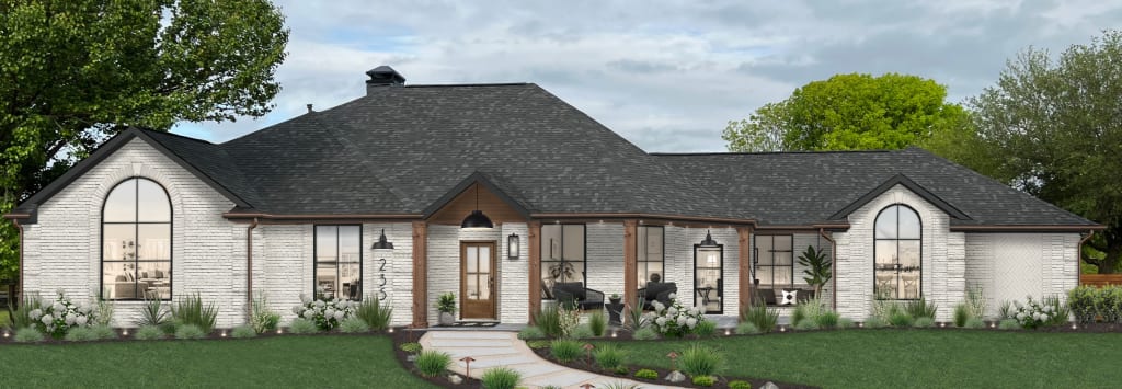 gray brick house with wood porch columns
