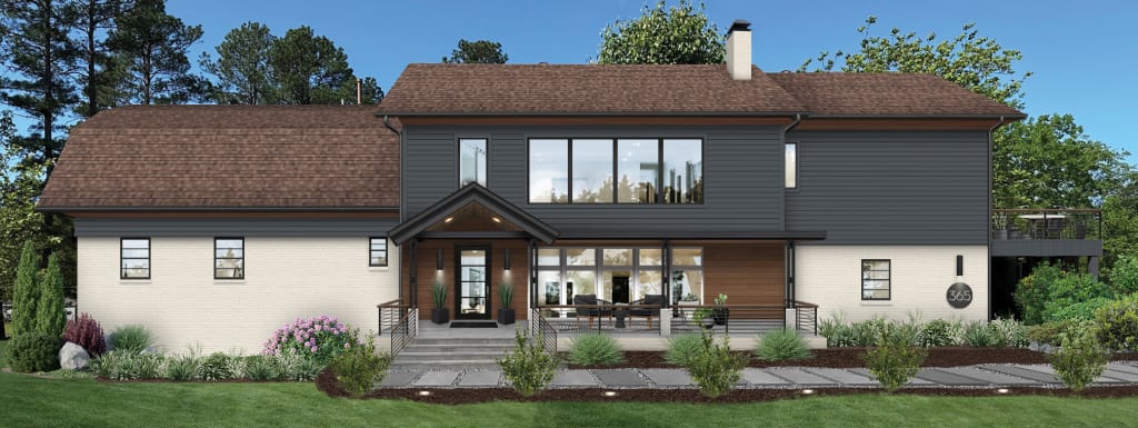 traditional house with off-white brick and navy siding
