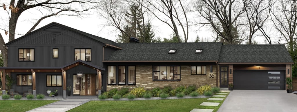 long split-level home with greenblack paint and brick accents