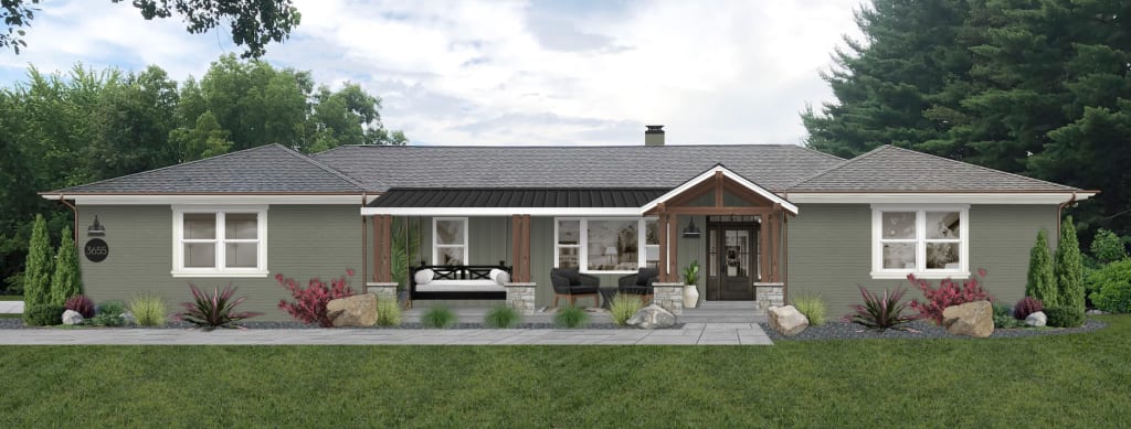 Traditional brick rancher with white windows, wood columns, and a wood front door.