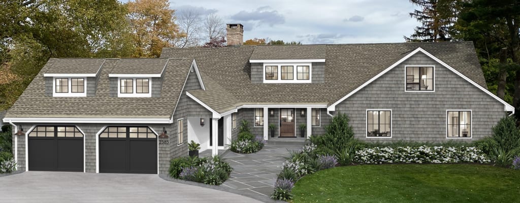 Virtual exterior design of a cedar shake home with trim painted in Simply White