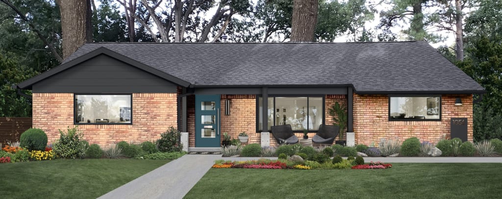 light orange brick home with a turquoise front door