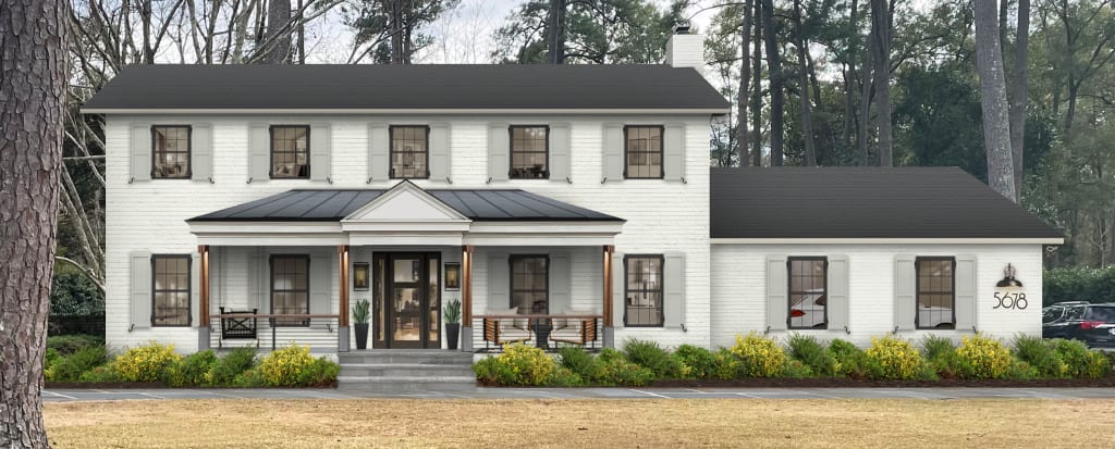Home exterior featuring white painted brick, light gray shutters, and a covered front porch.