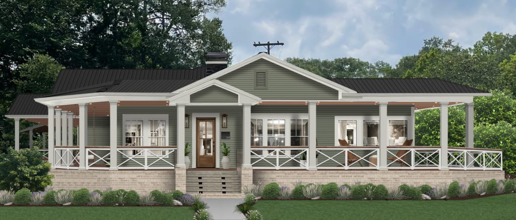 ranch home with green siding and white trim