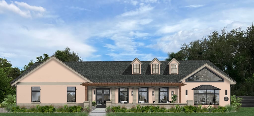 Light peach stucco home with gray shingled roof.