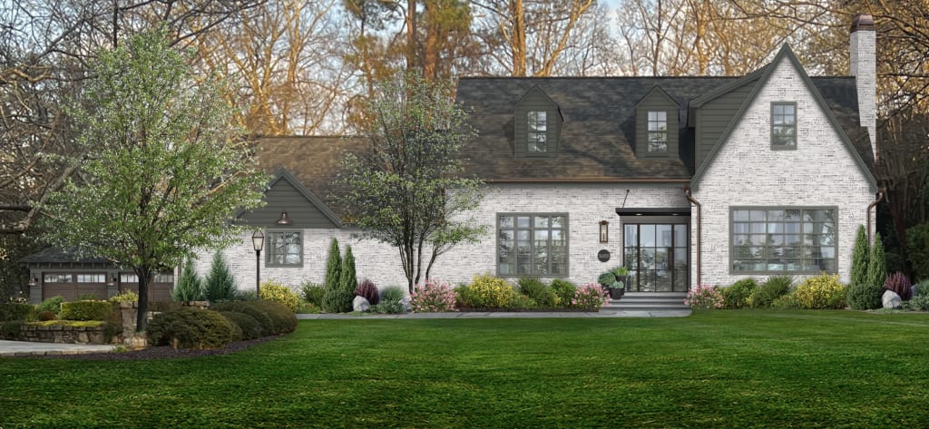 traditional stone house with modern door awning