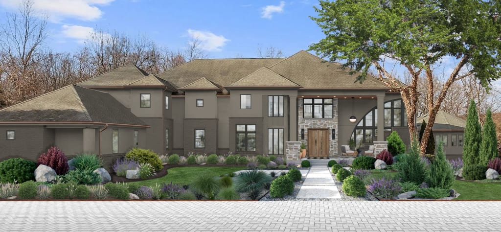 large house with stucco, brick, and stone