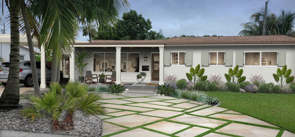 updated coastal bungalow with carport set among tropical plants