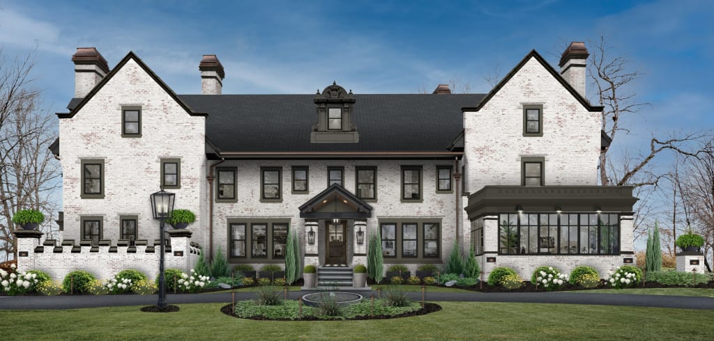 limewashed brick manor with olive window trim