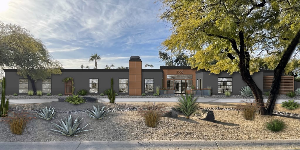 Ultra modern Southwest rancher with fiber cement siding, black windows, and drought friendly landscaping.