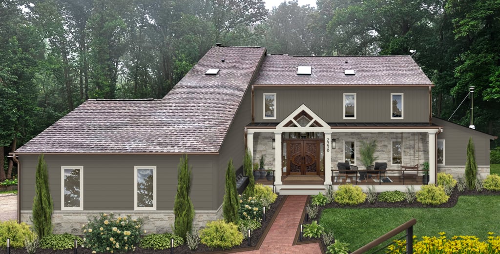 L-shaped house exterior with dark gray siding and white and stone accents.