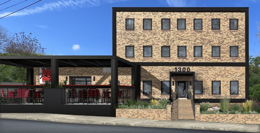 Digital rendering of brick commercial building with covered patio and black trim.