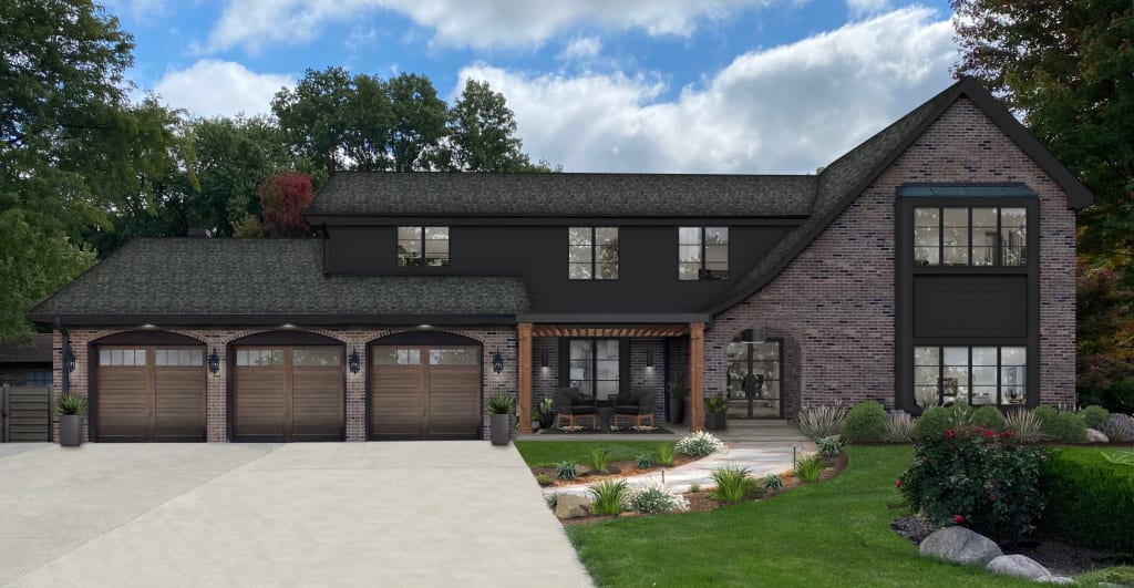 A Tudor-style home with Jet Black siding