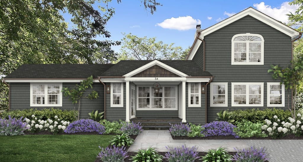 Cape Cod style home with thick white trim, dark gray cedar shake siding, and lush landscaping. Oyster Bay exterior house colour 2024