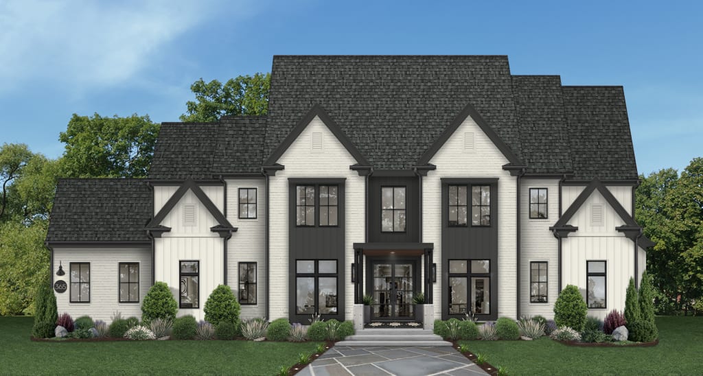 house with white brick and siding with black trim and gutters