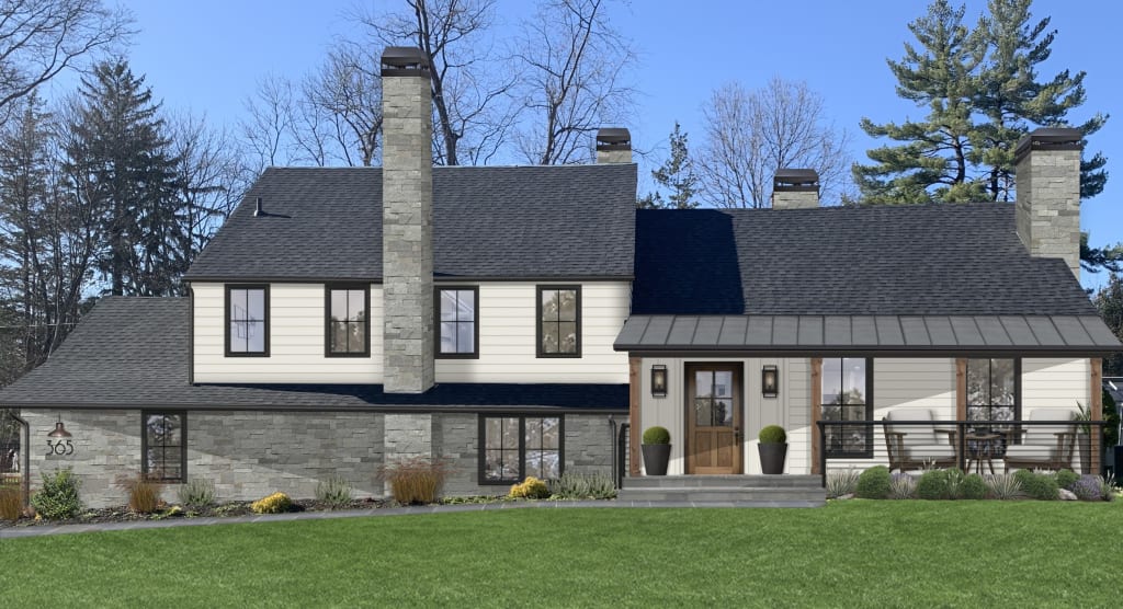 A home exterior featuring two outdoor planters framing the front door