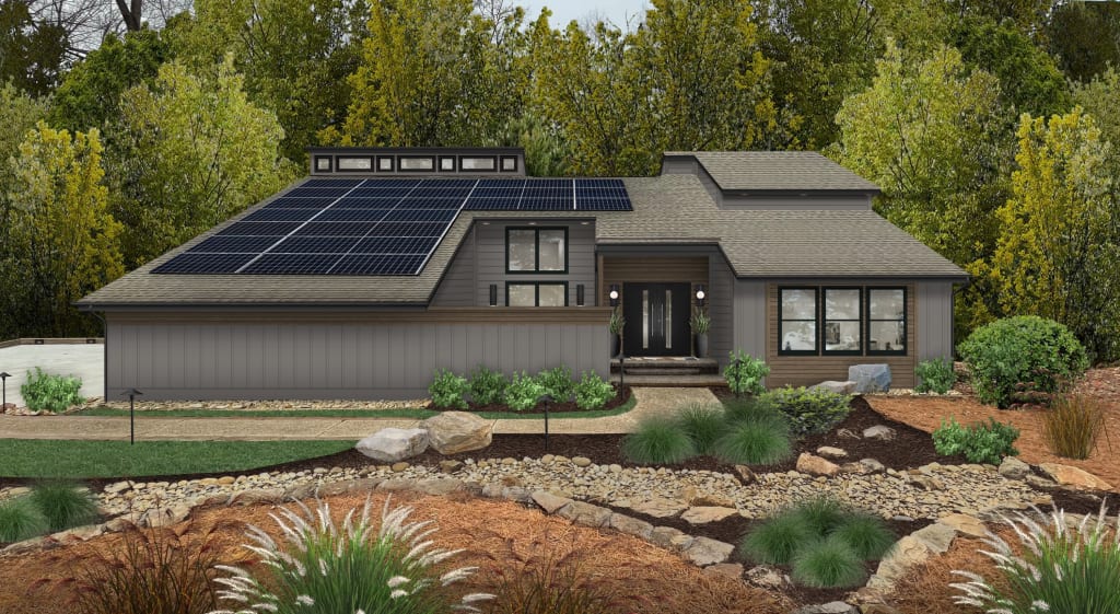 Contemporary home with dark gray siding and a shed roof
