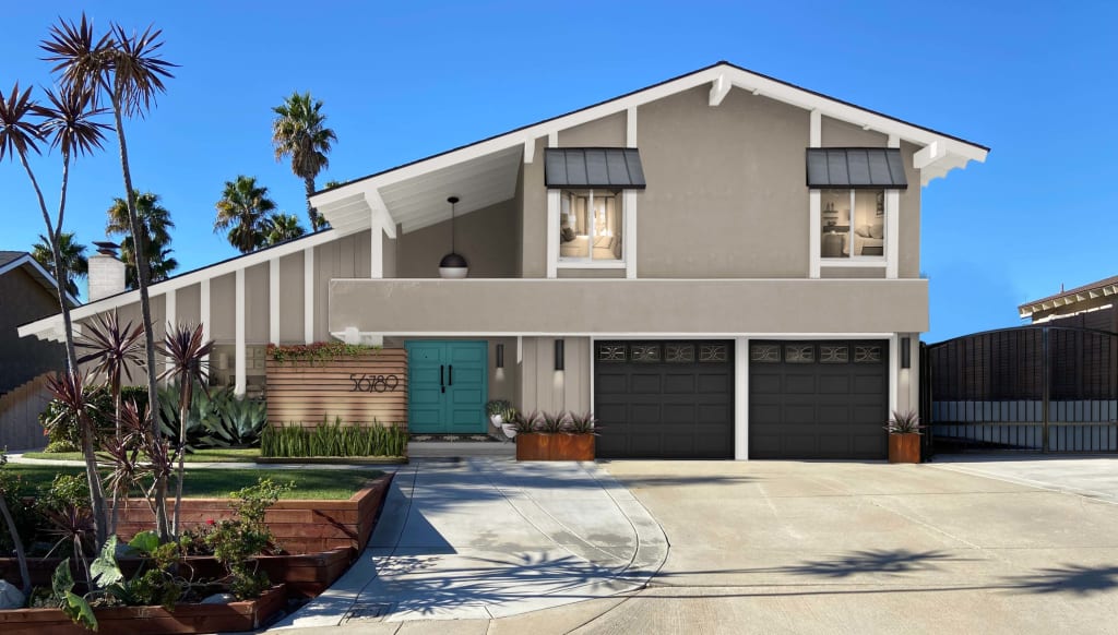 modern house with greige stucco and turquoise front door