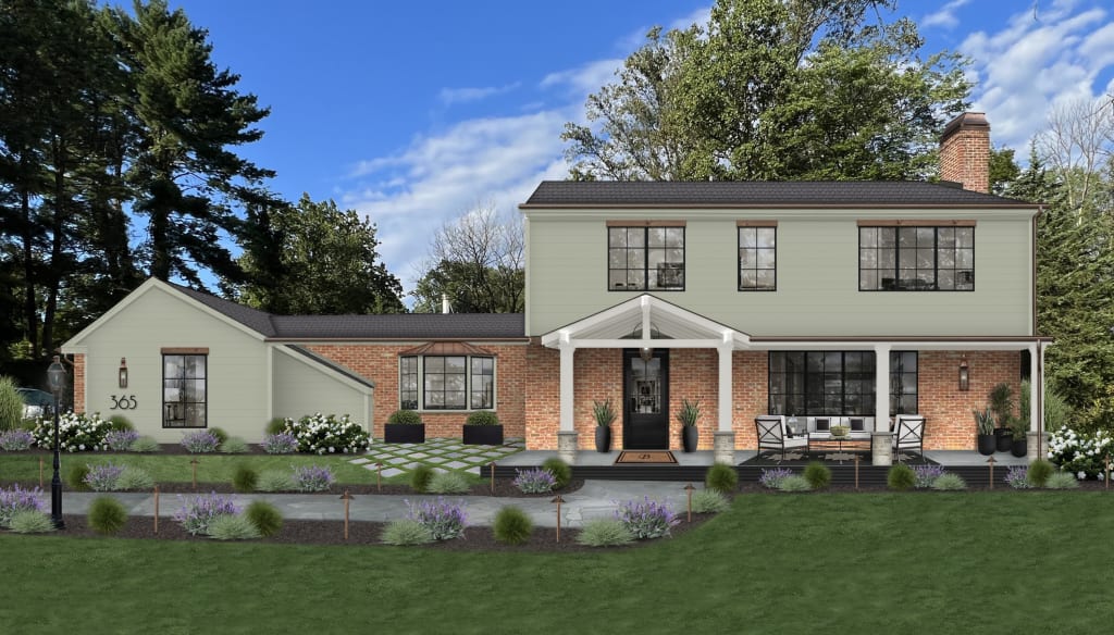 Split-level home with natural red brick, white columns, and wood lintels.