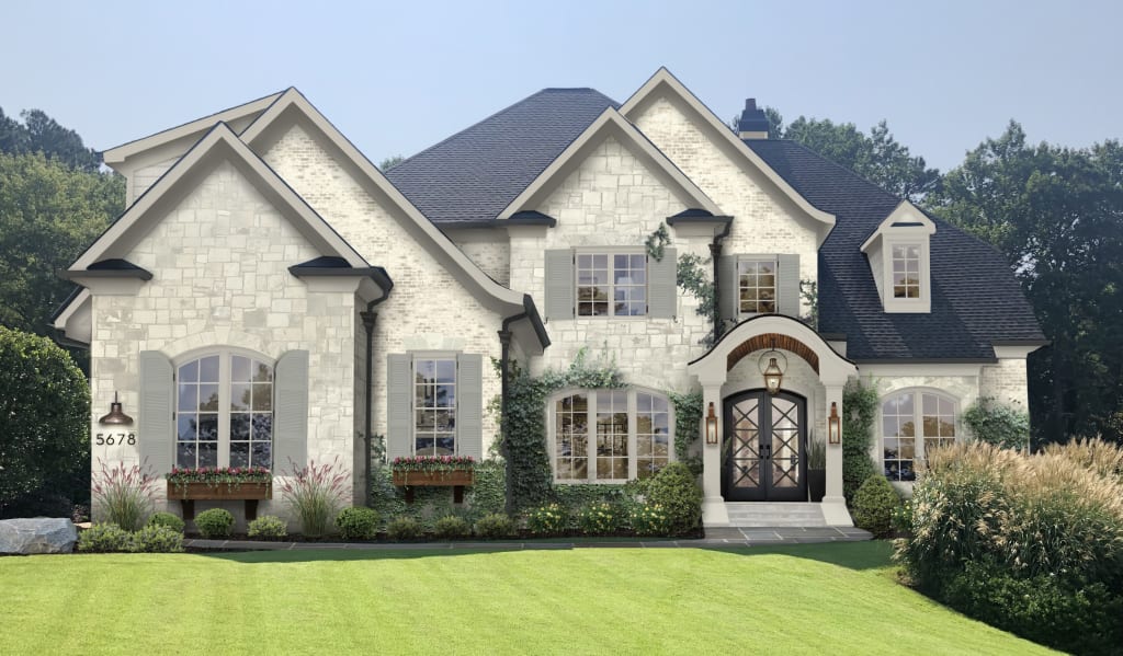 Virtual rendering of a stone home with a limewash, shutters, and flower boxes